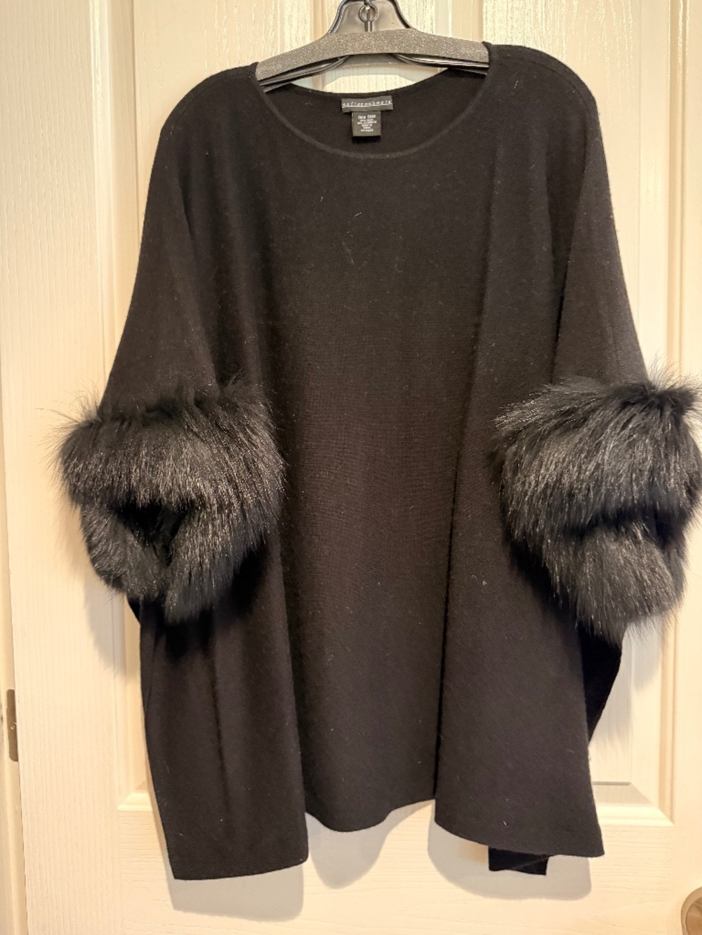 Sofia Cashmere one size midnight black poncho with trimmed fur cuffs.